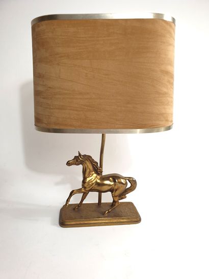 null Gilt bronze salon lamp decorated with a moving horse. Rectangular base. 
Work...