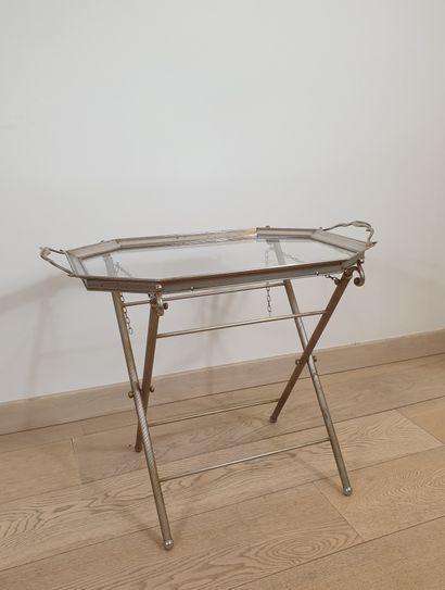 null Tea table in patinated metal. Folding legs. Glass top
20th century