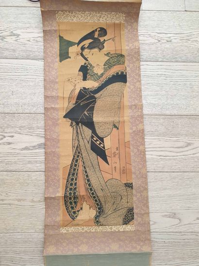 null Kakemono-e print by Eizan (1787-1867), depicting a courtesan reading a letter
Japan,...