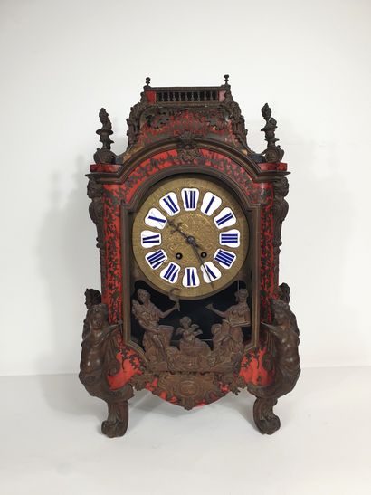 null Religious clock in red tortoiseshell veneer and brass with Boulle-style motifs,...