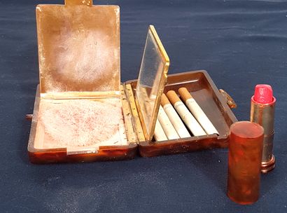 null Small tortoiseshell evening set including a cigarette holder, a mirror, a compact...