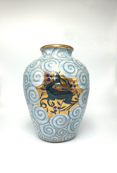 null Edouard CAZAUX (1899-1974) : 
Earthenware baluster vase with reserved decoration...