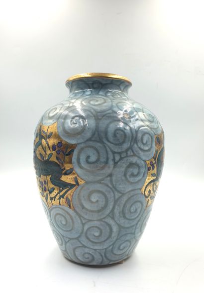 null Edouard CAZAUX (1899-1974) : 
Earthenware baluster vase with reserved decoration...