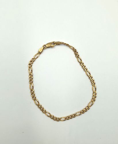 null 14k (585 ) yellow gold Figaro link bracelet.
Weight: 4.14 g. approx.
L. 19 ...