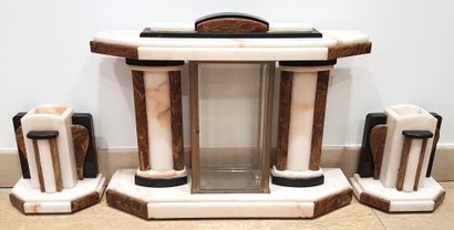 null Alabaster, marble and onyx mantel set comprising an architectural box housing...