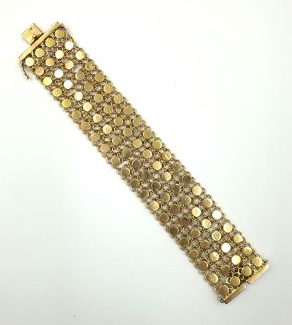 null Large flexible bracelet in 18k yellow gold (750‰) with attached pastille links...