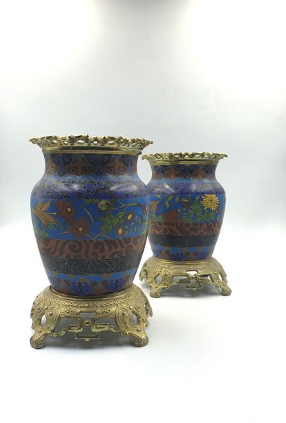 null Pair of cloisonné metal baluster vases with polychrome decoration of flowers...