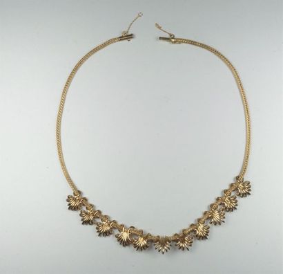 null Collier draperie en or jaune 18K (750/oo) maille colonne souple agrémenté de...