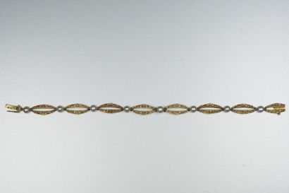 Bracelet ancien en or jaune 18K (750/oo)...