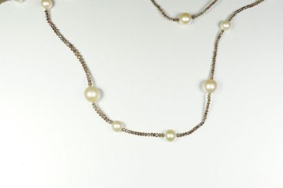 null Long necklace made of cognac diamonds cut into faceted pearls in a slight drop...