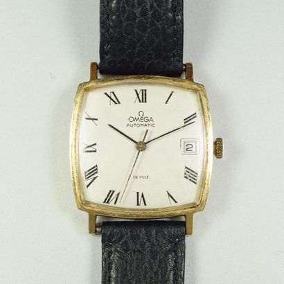 OMEGA DE VILLE Montre en or jaune 18K (750/oo), cadran coussin à fond argenté, chiffres...