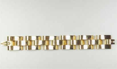 null Bracelet "Tank" en or jaune 18K (750/oo) à maillons géométriques articulés,...