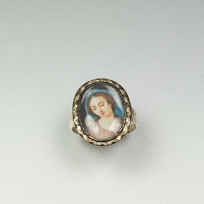 null Antique silver ring (800/oo), the oval guilloche plate decorated with a miniature...