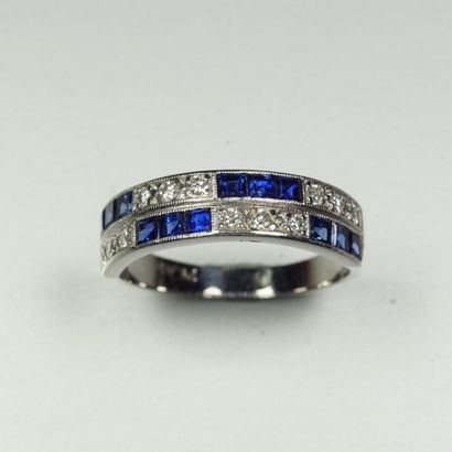 null Half wedding band in platinum (850/oo) centred on two lines of alternating round...