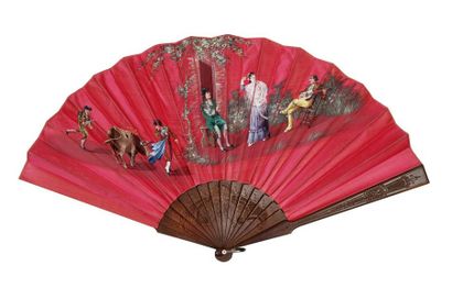 null FAN FOLDED ON RED SILK. Beech wood strands and plumes finely carved with Moorish...