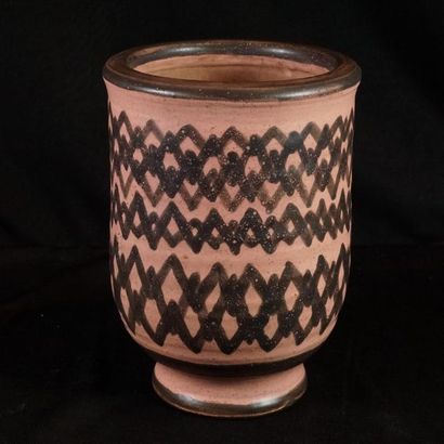 CHRISTOFLE Glazed ceramic vase with brown geometric decoration on a pink background...