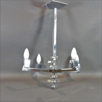 null Modernist chandelier with four arms of light in chromed metal, the central was...