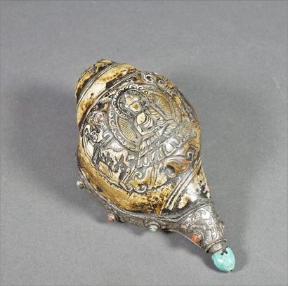 null Set of two ceremonial conches: conch formed by a silver-mounted shell with animal...