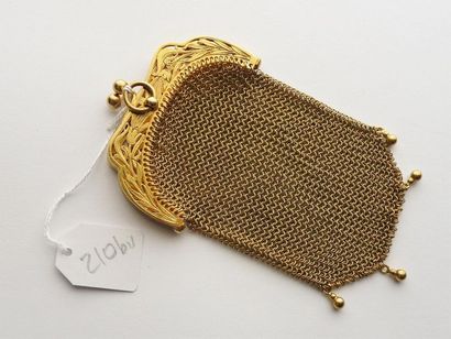null 18K (750/oo) yellow gold ribbed purse decorated with four gourds in pendants....