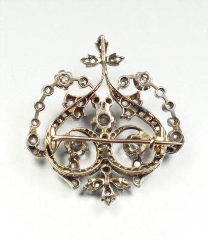  Brooch Pendant in 18K (750/oo) yellow gold and silver (800/oo) with openwork decoration...