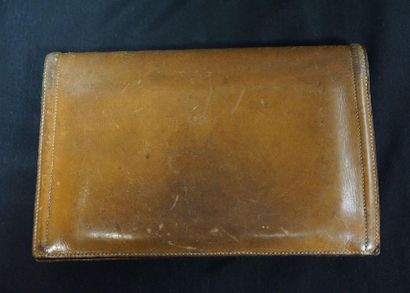 HERMES Paris - Brown leather pouch. 15 x 23 cm. Traces of wear, stains and slight...