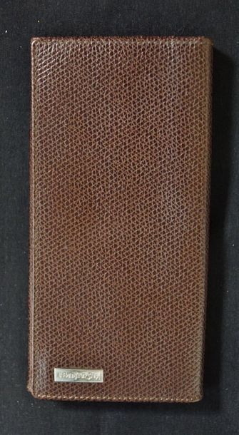 YVES SAINT LAURENT Paris - Portefeuille en cuir marron. 9 x 18,5 cm. 