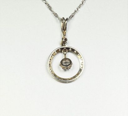 null Antique pendant in 18K (750/oo) white gold and platinum (850/oo) forming an...