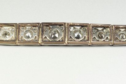 null Bracelet in silver (800/oo) and 18K (750/oo) gold with rectangular openworked...