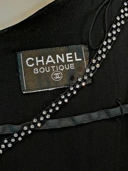 CHANEL Cocktail dress CHANEL in silk crepe, strass straps, buttoned in the back,...