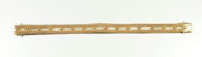 Bracelet fils d'or jaune 18 K 750°/°° L 18.5cm...