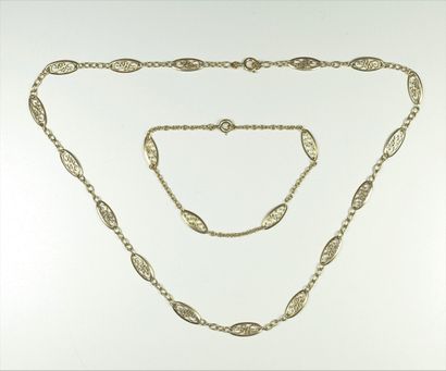 null Collier en or jaune 18 K 750°/°° à motifs ajourés on y joint un bracelet au...