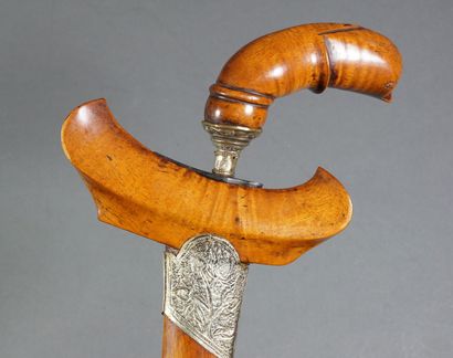 null Small Kriss. Elegant model with wooden handle with stylized bird head. Slightly...