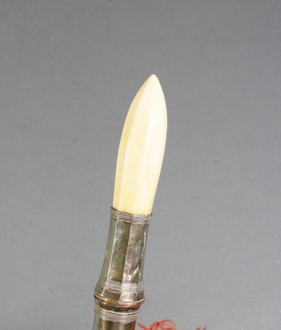 null Beautiful dagger with a worked ivory handle and a silver filigree metal ferrule....