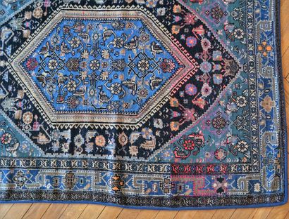 null Oriental carpet with stylized flowers on a navy background (alterations and...