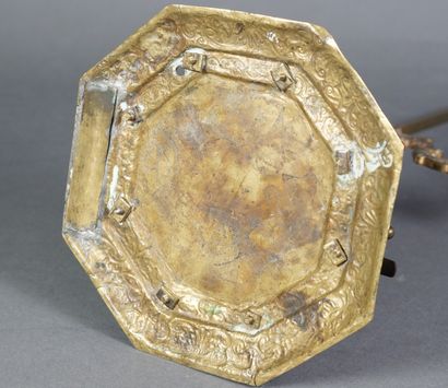 null An octagonal chased, engraved and gilded brass writing desk, each side decorated...