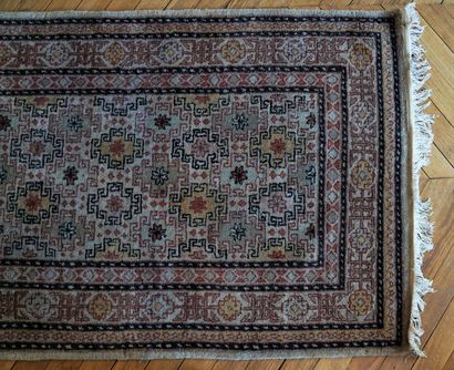 null Carpet with geometrical decoration on a beige background Chinese work in the...