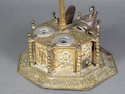 null An octagonal chased, engraved and gilded brass writing desk, each side decorated...