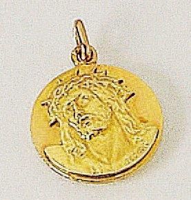BECKER pour BOUCHERON Médaille en or jaune ornée d'une tête de christ. Signée et...