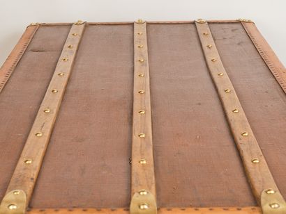 MALLE CABINE In brown coated canvas. Brass closures, handles and corners. Lozenge...