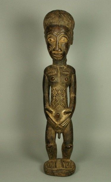 BAOULE Cote d’Ivoire BAOULE Cote d’Ivoire statuette en bois patiné représentant un...