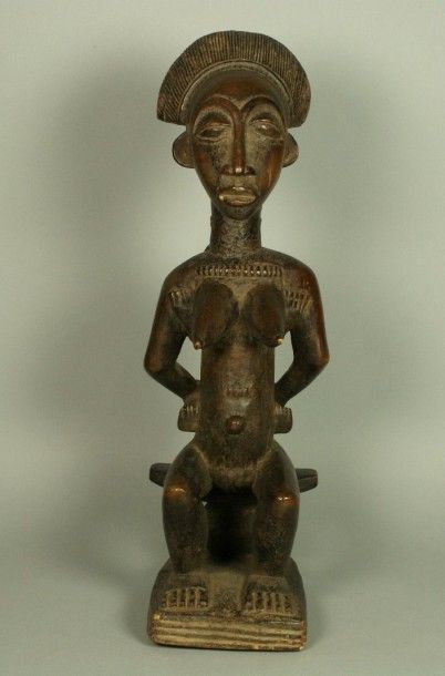 BAOULE Cote d’Ivoire BAOULE Cote d’Ivoire Statuette en bois patiné représentant une...