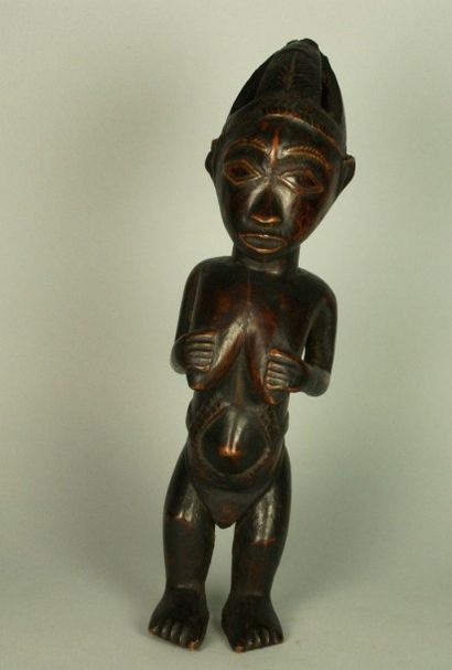 CONGO CONGO Statuette en bois patiné représentant une femme debout. Travail 2ème...