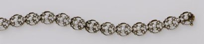 null Bracelet ancien en argent (900/oo) et or jaune 18K (750/oo) composé de maillons...