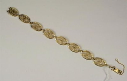 null Bracelet ancien en or jaune 18K (750/oo) à maillons ovales filigranés.
Poids...