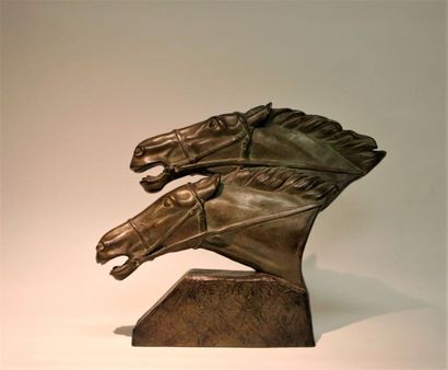 Irénée ROCHARD (1906-1984) Les chevaux Terre cuite à patine bronze, signée. 44 x...