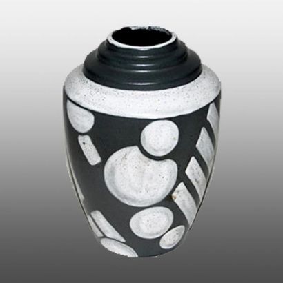 MONTIERES Vase ovoïde en céramique émaillée à décor en léger relief de cercles et...