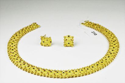 null Demi parure en or jaune 18K (750/oo) composée d'un collier à maillons plats...
