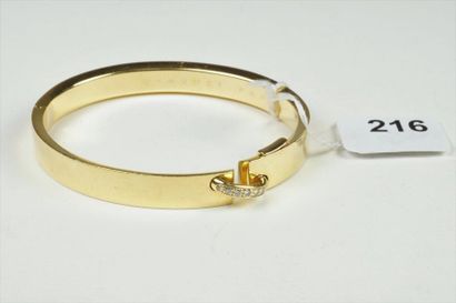 CHAUMET Bracelet "Jonc" ouvrant en or jaune 18K (750/oo), modèle "Lien", orné d'une...