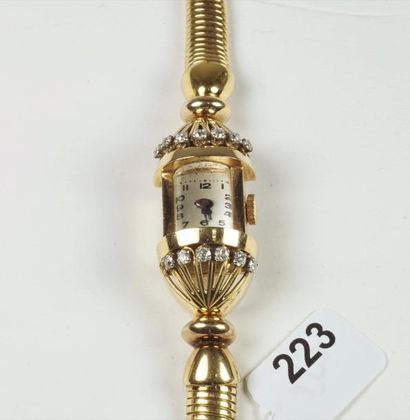 null Montre brcelet de Dame en or jaune 18K (750/oo) cadran carré, chiffres arabes...