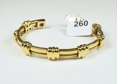 TIFFANY & CO Bracelet en or jaune 18K (750/oo) à plaquettes rectangulaires alternées...